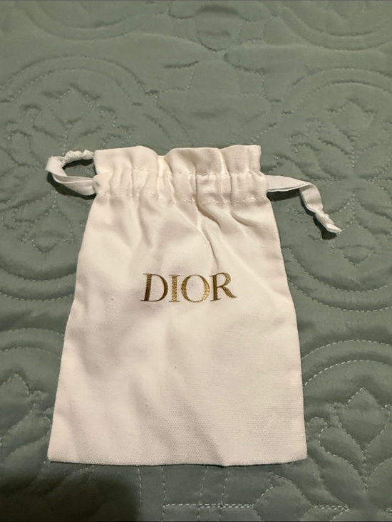 Dior Handbags - Dior White Drawstring Pouch with Gold Logo